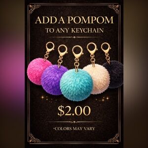 Pom Pom Keychain Accessory for $2 with keychain purchase.